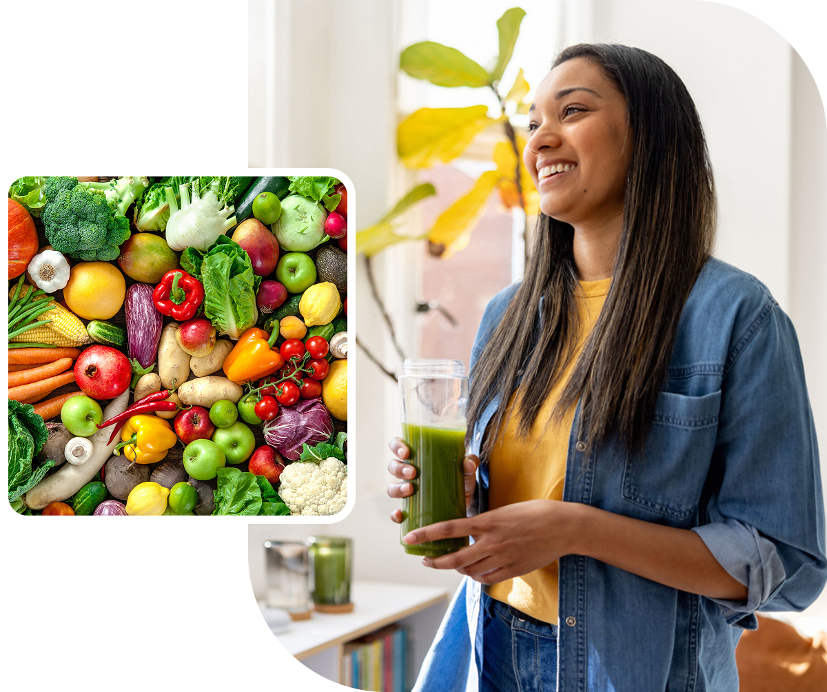 Woman holding green smoothie with fresh produce