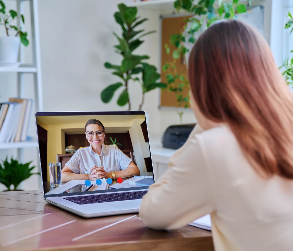 Video call between two people on laptop.